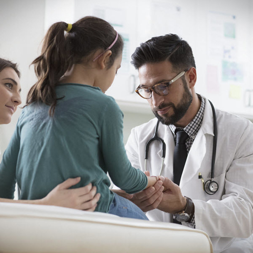 Picture of a doctor with young girl